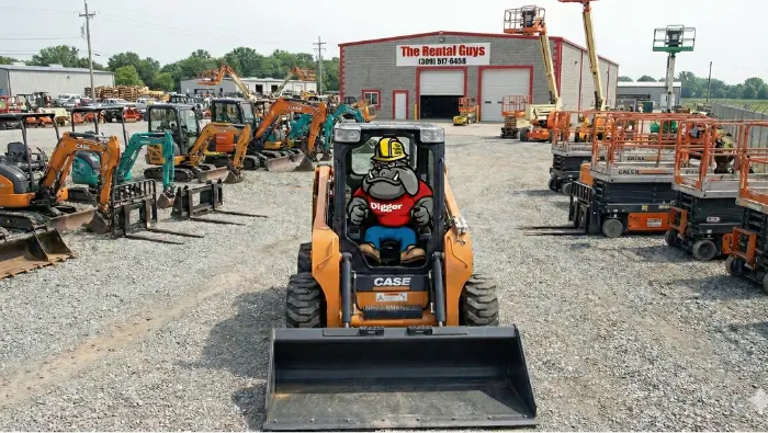 The Rental Guys Mascot operating a Case skid loader